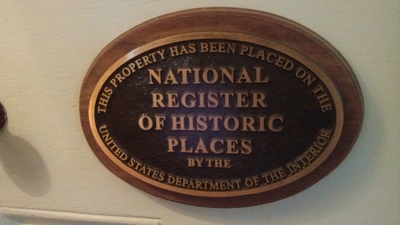 Plaque on front door of Havens House Museum: "This property has been placed on the National Register of Historic Places by the United States Department of the Interior."